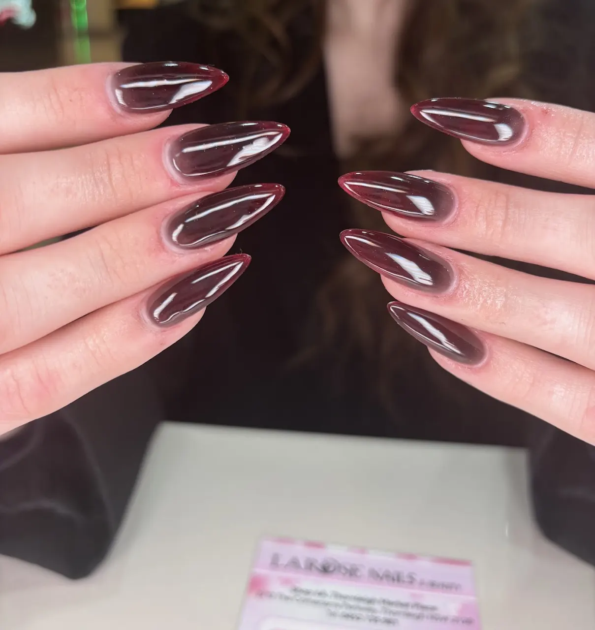 Chrome cat-eye almond nails done at Larose Nails & Beauty